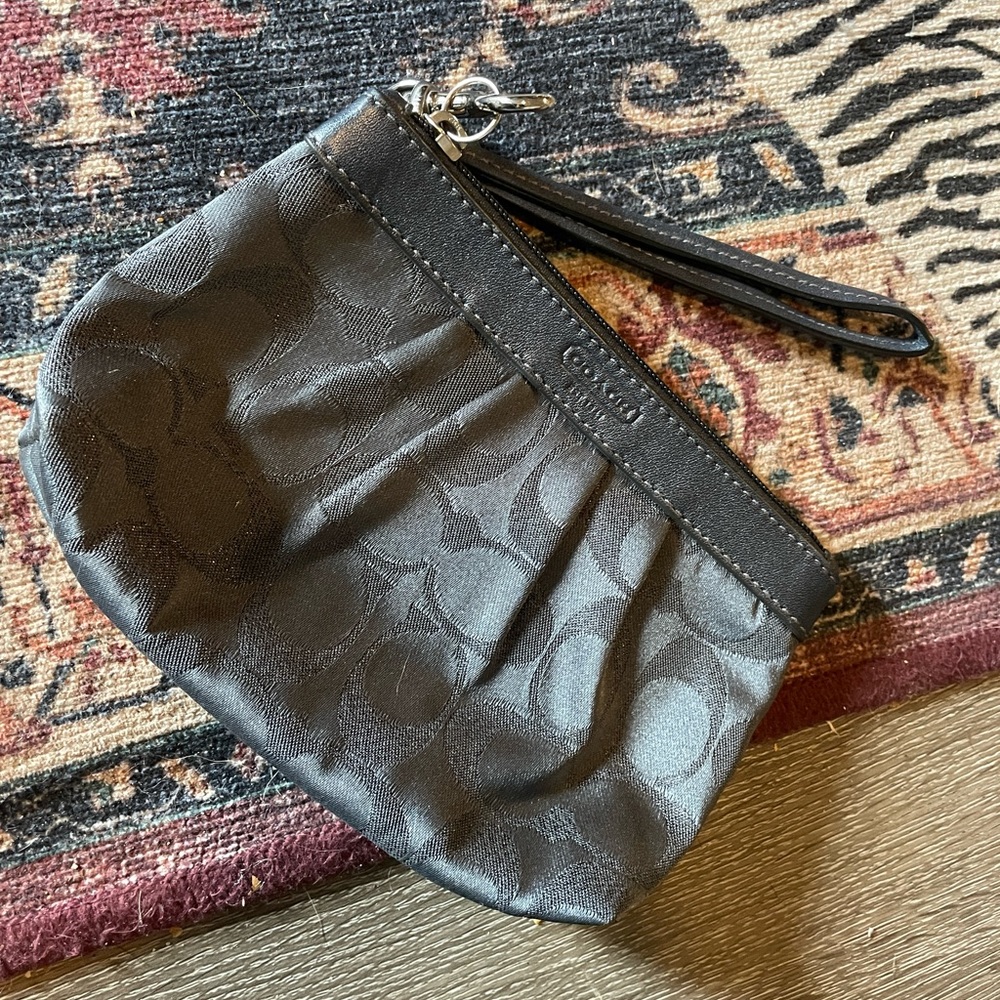Coach wristlet! Barely used and in perfect condition!